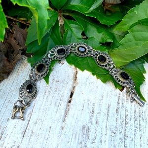 Danny Pollak black Swarovski bracelet.